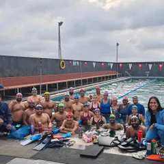 Our adult squad is proof that you can find a strong community at any age. We train hard together and support each other through every lap. This is our team.