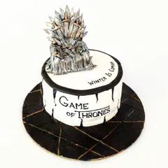 For the ultimate Game of Thrones fan, I handcrafted this Iron Throne cake. Every single sword on the throne was individually sculpted from fondant to create a centerpiece worthy of a king. This is a rich chocolate hazelnut cake, proving that intricate designs can also be incredibly delicious.