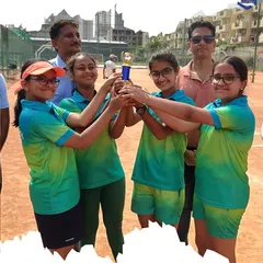 Success is a team effort. We are incredibly proud of our girls' team, seen here celebrating their tournament victory. Our competitive training program is designed to prepare players for events like the SGFI and turn their hard work into trophies.
