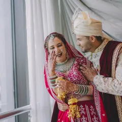 A burst of uncontrollable laughter between the bride and groom. These are the genuine, joyful moments I love to capture.