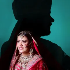 An artistic double exposure portrait, overlaying the groom's silhouette on a beautiful shot of the bride.