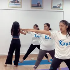 A little progress each day adds up to big results. Here, I'm helping a student find more length and correct alignment in Virabhadrasana II (Warrior II).