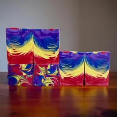 The vibrant swirls in this Rainbow Bloom soap are created using a special "One Pot Wonder" technique. I love experimenting with colors and pours to make each cold process bar a unique visual experience.