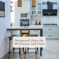A designated appliance zone with a built-in microwave and oven is a must for a functional kitchen. This design keeps appliances neatly integrated within a tall unit, maintaining clean lines and saving counter space.