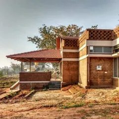 This is a real-world example of my principles in action. The building uses compressed stabilized earth blocks (CSEB) and a Mangalore tile roof, materials local to the region. This approach, known as vernacular architecture, reduces environmental impact and creates structures that are naturally suited to the climate.