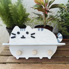 For all the cat lovers out there, I designed this purr-fectly adorable cat-shaped shelf. It includes three little pegs for hanging small items, making it a cute and practical organizer for a child's room or even a pet's corner.
