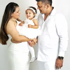 A classic family portrait session, timeless and full of love. Coordinating in white creates a clean, bright look that keeps the focus on the happy interactions and beautiful smiles.