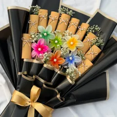 A trendy and innovative flower bouquet made of colorful hair clips. This is a perfect 'forever bouquet' for a girlfriend or any young girl who loves unique accessories.