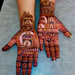 An example of my architectural style mehandi, with detailed palace windows (jharokhas) and peacocks, giving a royal Rajasthani feel.