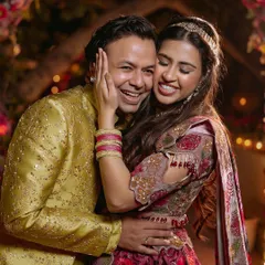 A moment of pure, uninhibited joy and affection between the couple during their Sangeet. This is the kind of candid emotion I strive to capture.