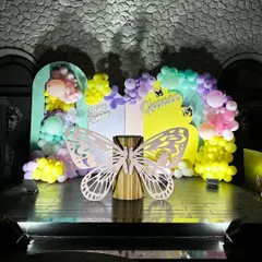 We brought a magical butterfly garden to life for a first birthday party. This whimsical setup features a pastel balloon arch, custom butterfly cutouts, and soft lighting to create an enchanting atmosphere for the little one's big day.