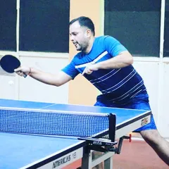We also have a strong group of adult and corporate players. This action shot shows one of our adult players, Shubham, competing in a corporate table tennis tournament.