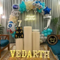 An astronaut-themed party for Vedarth's 7th birthday, set up in a living room to show how I can transform any space.