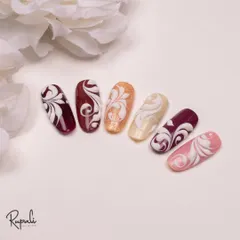 Here, I've combined embossed swirls with a textured sand effect. This demonstrates how you can layer different techniques for a unique finish.
