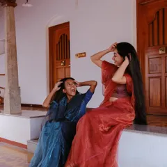 A candid, happy moment with a fellow model on set. I believe having fun during a shoot always translates into more natural and joyful final images.