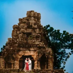 A majestic portrait of a couple nestled within the ancient Anjaneri temple ruins in Nashik. This shot combines grand landscapes with intimate moments for a truly epic wedding photograph.