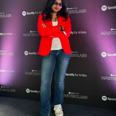 Posing for a photo at the Spotify Masterclass. It was an incredible opportunity to represent the indie scene and share my experiences.