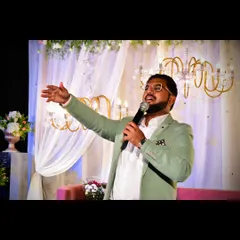 A shared joy is a joy made double. Here I am engaging with the guests at a wedding reception, making sure everyone feels like part of the celebration.