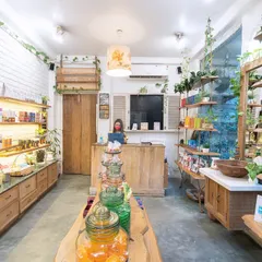A wide view of our retail section, where you can discover the magic of our handcrafted wellness essentials. Our team is always here to help you find the perfect product.
