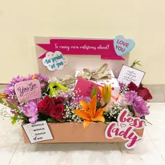 For the 'Boss Lady' mom, this hamper is a celebration of her achievements. It's filled with vibrant flowers and fun, encouraging messages to show how proud you are.