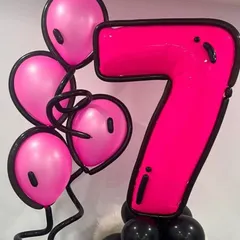 These cartoon-style balloon structures are so much fun. This number "7" and matching balloon bunch have a unique 2D-inspired look with black outlines.