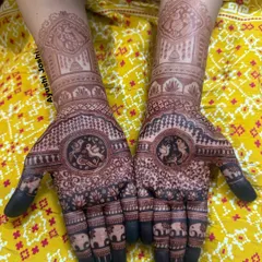 Let the stain do the talking. This is the gorgeous dark color of a design featuring lovebirds and elephants, perfect for an engagement or Roka ceremony.