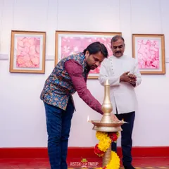 Here we are inaugurating the exhibition with the traditional lighting of the lamp. It was a moment of shared respect for the arts and the talented individuals showcasing their work.