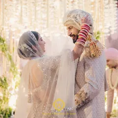 An intimate moment between the bride and groom during their minimalist wedding ceremony. The simple, elegant decor allows their love to be the true centerpiece.