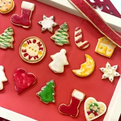 Another look at the variety in our Christmas cookie sets. We include everything from hearts and moons to stockings and Christmas trees, all decorated by hand with colorful icing.