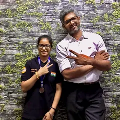 Celebrating a back-to-back win with one of our talented young shooters. Success is a habit we cultivate at the academy.