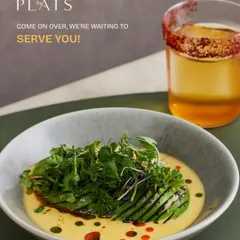 A warm invitation to our table. This dish of grilled avocado in a creamy sauce, paired with a signature cocktail, represents the welcoming and unforgettable experience I strive to create.