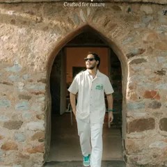 This is from a campaign for Royal Enfield's apparel line. The goal was to create a lifestyle product shot that feels natural, positioning the clothing for explorers and adventurers within a rustic, architectural setting.