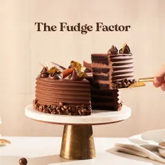 Here is my Chocolate Fudge Cake, a true showstopper for any celebration. I layer moist chocolate sponge with smooth buttercream and a rich milk chocolate ganache, then finish it with delicate chocolate flakes and gold leaf for that extra touch of elegance.
