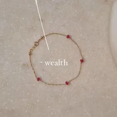 Another view of the Ruby Baati Bracelet, a stone of good fortune for the body, mind, and soul.