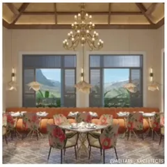 The dining area of our Nahan hotel project, designed as a visual masterpiece. The space features floral-patterned chairs, an orange banquette, and large windows that frame the mountain views, creating an opulent dining experience.