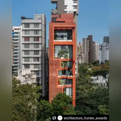 Seen from a distance, the Sarvasva tower asserts its unique identity. The vertical gardens we designed are not just additions but are fundamental to the architecture, creating a landmark of sustainable urban living.