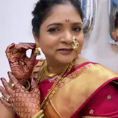 The mother of the groom, looking absolutely regal. I love creating looks for the mothers of the bride and groom, ensuring they feel just as special.