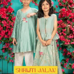 This mint green sibling set is perfect for summer celebrations. The breathable fabric keeps them comfortable, while the matching bird embroidery on his kurta and her lehenga creates a beautifully coordinated look.