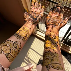 A bold and beautiful floral design captured in the golden hour light. The large, open flowers are the main focus, creating a very contemporary and artistic feel.