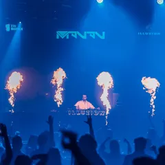 A wall of fire creates a stunning backdrop for my set. It's a high-impact visual that matches the music's intensity.