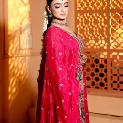 This look has my heart. A beautiful side profile of my bride, showing her elegant hairstyle and the rich colors of her outfit.