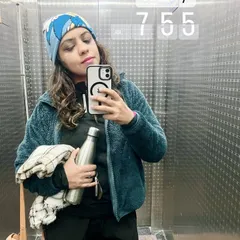 The "before" photo from the same student's journey. It shows her commitment from the very beginning, reminding us that every expert was once a beginner. We are here to support you at every step.