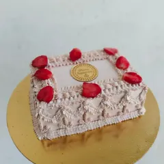 A full view of the square vintage cake, showing the delicate lace-like buttercream details. This design is perfect for anniversaries, bridal showers, or Valentine's Day.