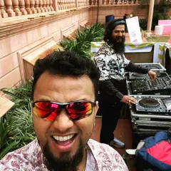A great selfie with a fellow DJ during a daytime event. We're always having a good time while making the crowd dance.