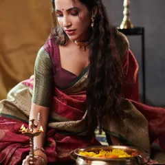 A serene and traditional look. For this shoot, I created a soft, classic Indian makeup look with kohl-lined eyes, a small bindi, and a natural lip color, perfectly complementing the beautiful silk saree.