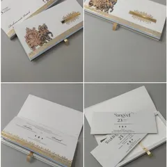 For a clean and royal look, this white and rose gold boxed invitation is a perfect choice. The set includes a main box with a metallic baraat carriage emblem, along with matching inserts for your Sangeet and Wedding events.