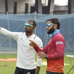 An on-field discussion with an Odisha cricket player. This is where we translate gym-based strength into sport-specific skills, analyzing movement and providing real-time feedback during a training session.
