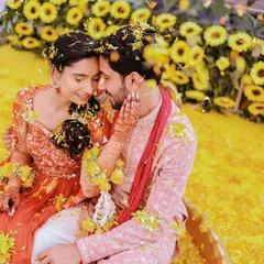 The vibrant colors and infectious laughter of a Haldi ceremony. We love capturing the energy of pre-wedding rituals, focusing on the genuine smiles and intimate moments shared with loved ones.