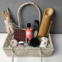 A 'Best Friends Forever' hamper packed in a lovely jute basket. This one includes a bamboo amplifier, body care products, a unicorn mug, a chocolate-shaped notebook, and other cute items perfect for your bestie.