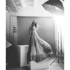 A behind the scenes shot showing my studio lighting setup. Understanding how to shape light is the most critical skill in photography. This black and white image shows the raw setup before the final magic happens.